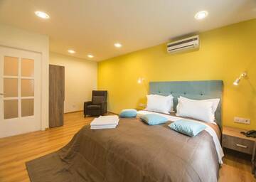 Апартаменты с 1 комнатой, кухней и балконом в  Partner Guest House